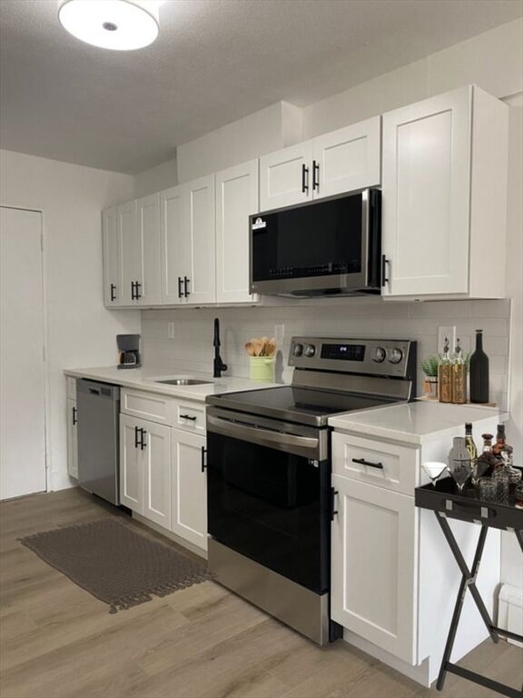 Property Photo: 880 E 4th St. 18 MA 02127