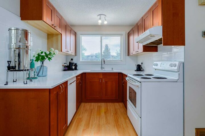 Property Photo: 740 Bracewood Drive SW 96 AB T2W 3N3