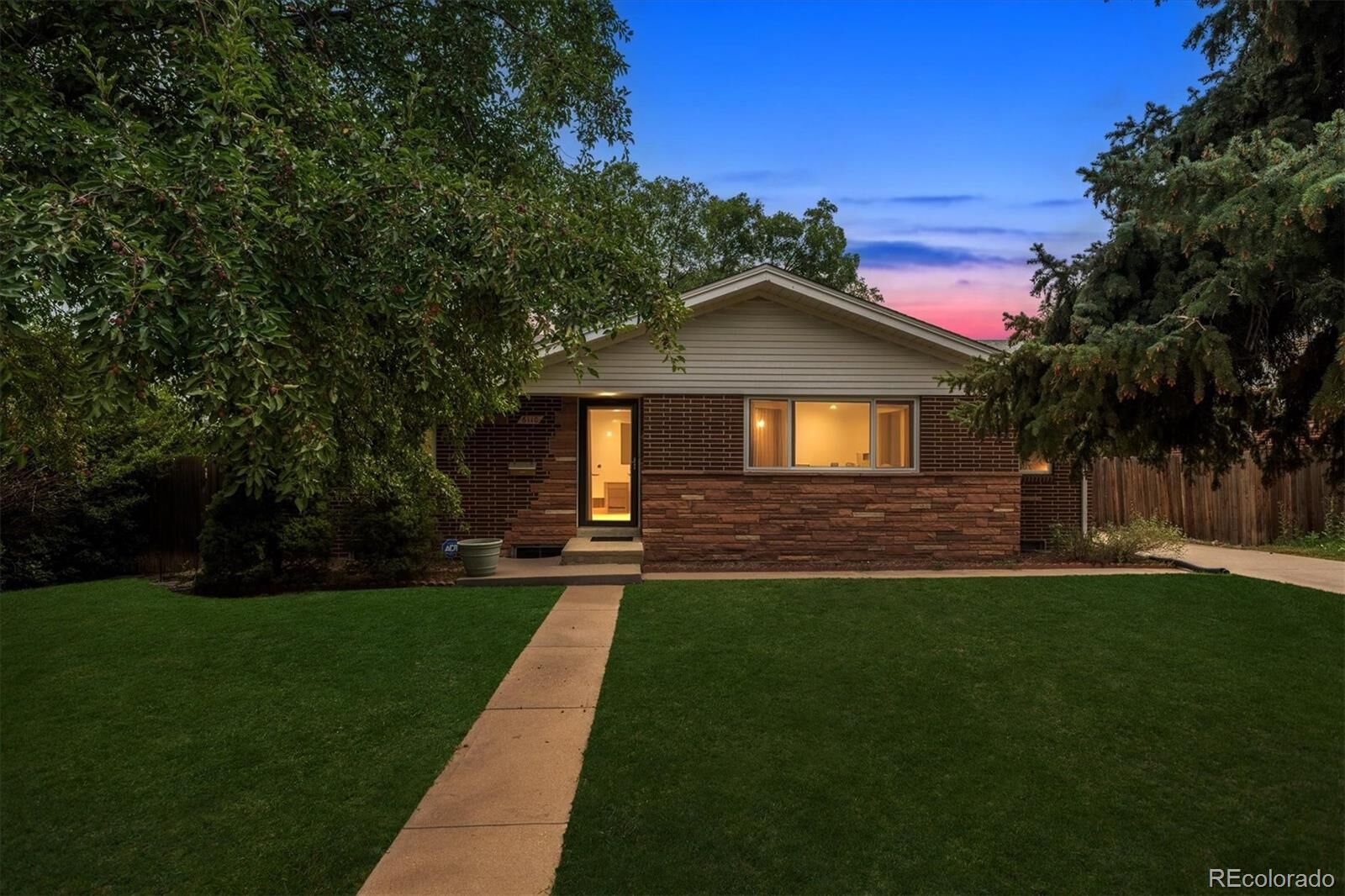 Property Photo: 6110 Harlan Street CO 80003