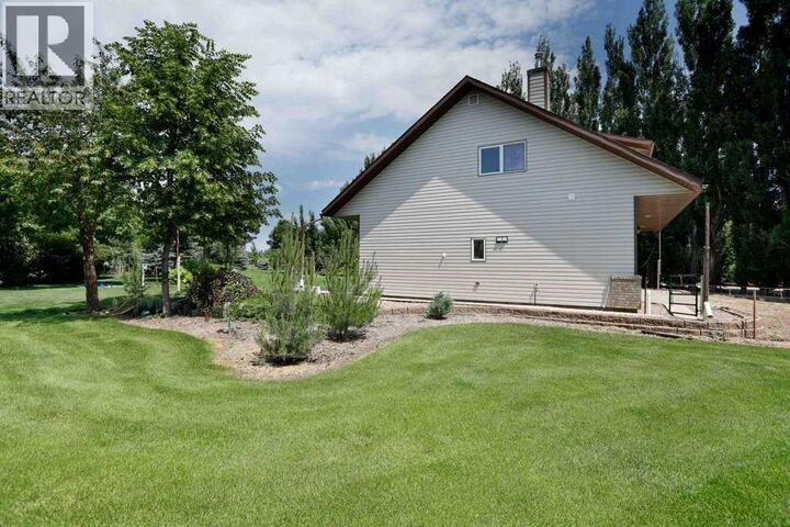 Property Photo: 145006 Cassils Road AB T1R 1B4