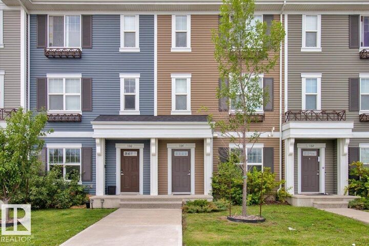 Property Photo: 8530 94 Street 104 AB T8L 0V8