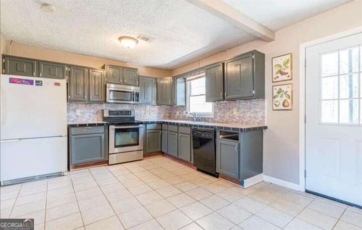 Property Photo:  4364 Housworth Drive  GA 30038 