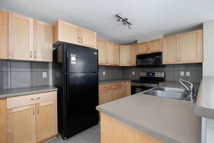 Property Photo:  108 Denholm Gate 401  AB T9H 0B3 