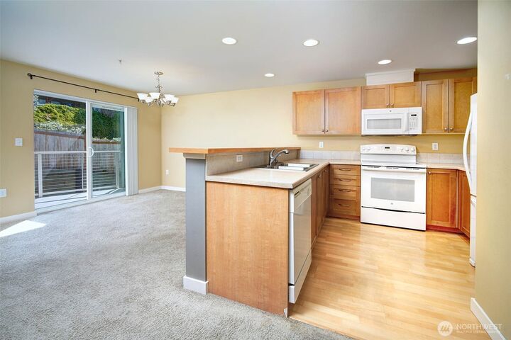Property Photo:  11920  98th Avenue NE 205  WA 98034 