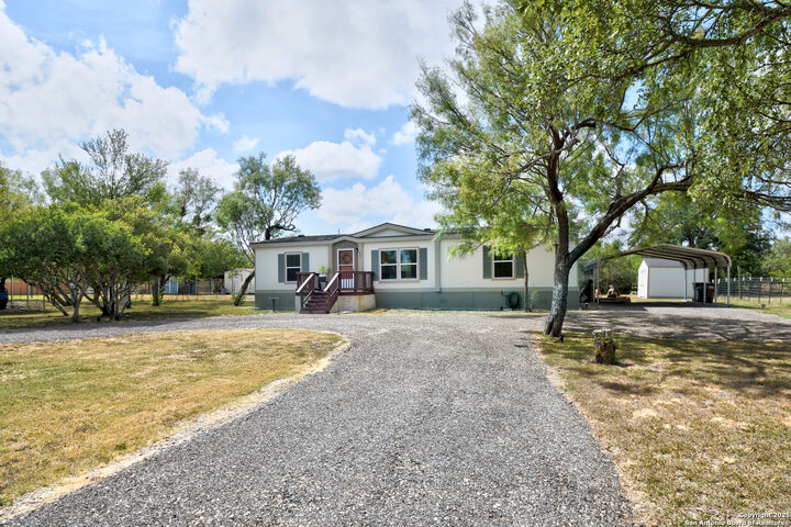 Property Photo: 605 County Road 3821 TX 78253