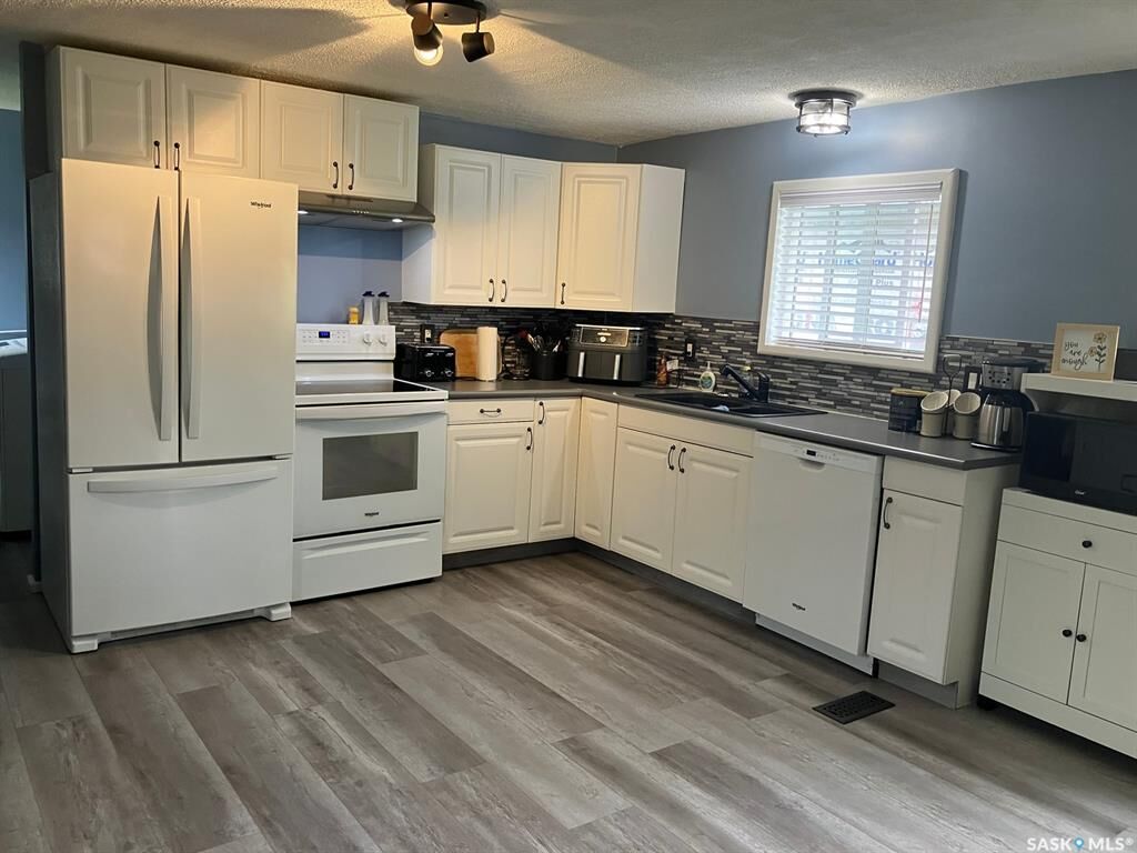 Property Photo:  108 1st Street E  SK S0J 0M0 