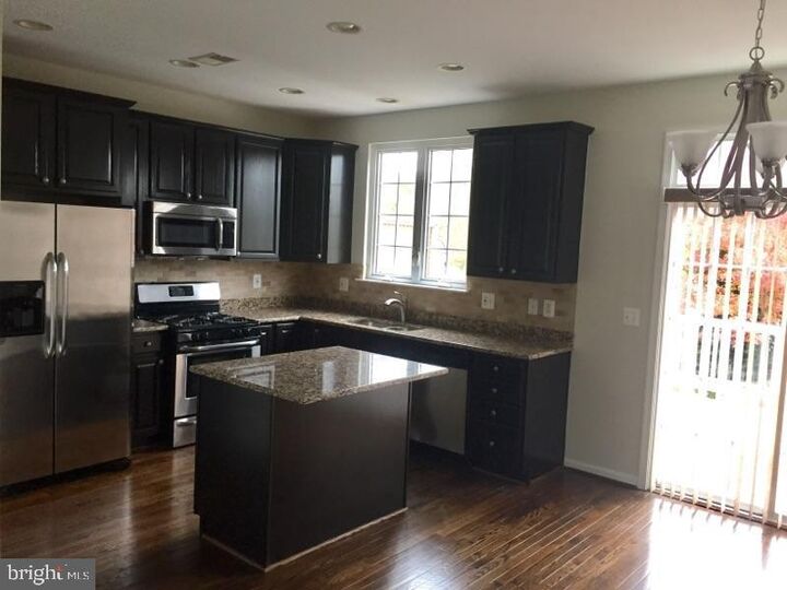 Property Photo:  24706 Clock Tower Square  VA 20105 
