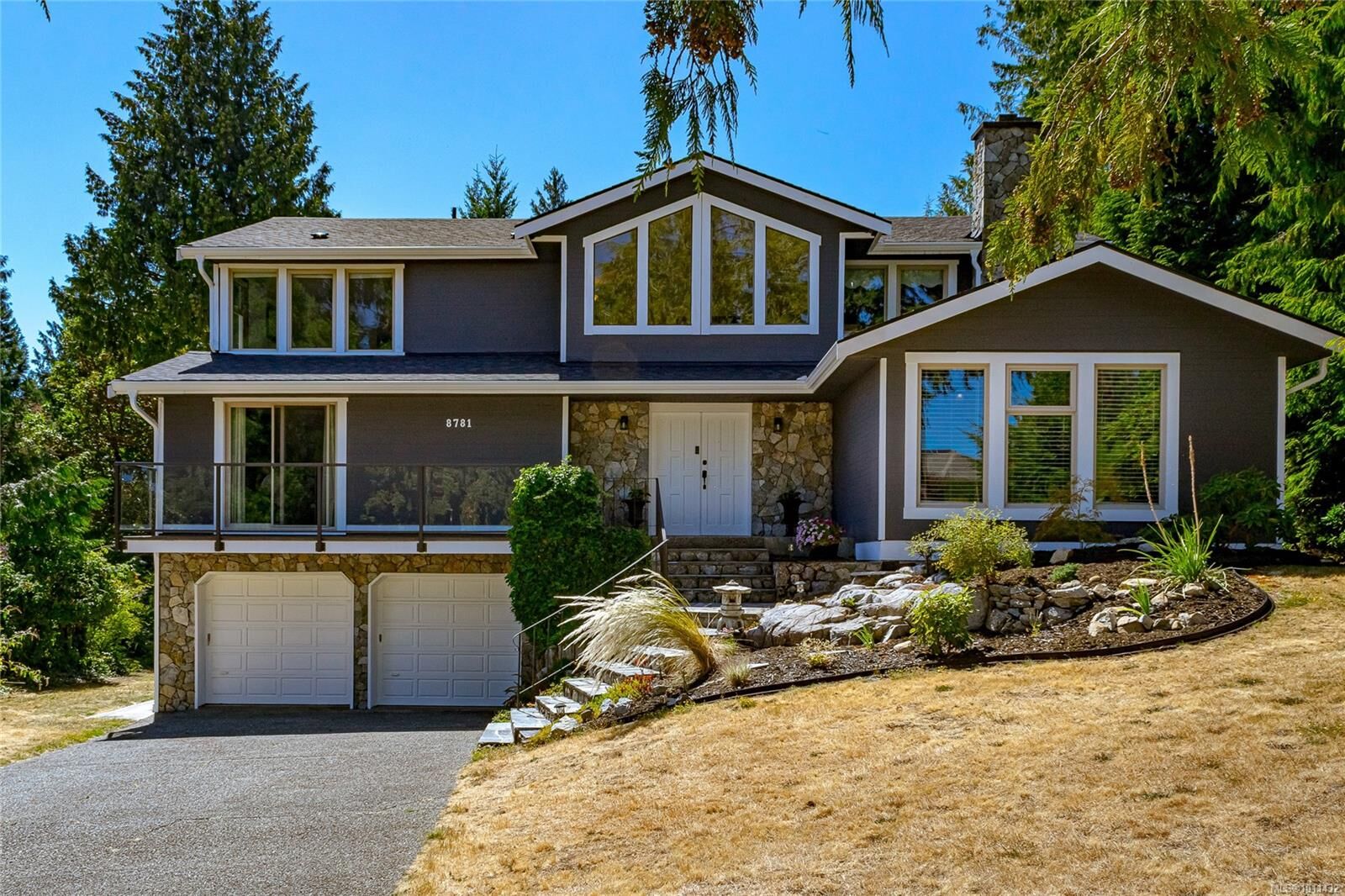 Property Photo:  8781 Forest Park Dr  BC V8L 4E8 