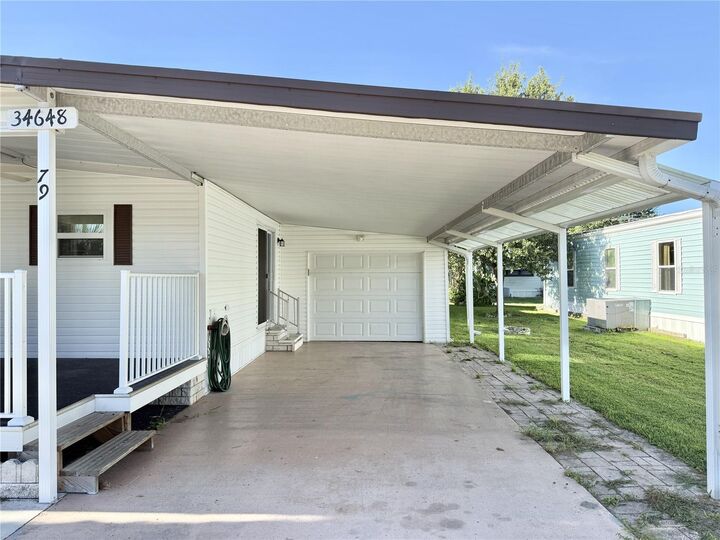 Property Photo:  34648 Sweetpea Lane  FL 33541 