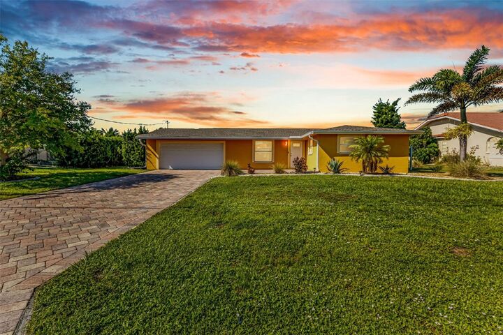Property Photo: 115 Sinclair SE FL 33952