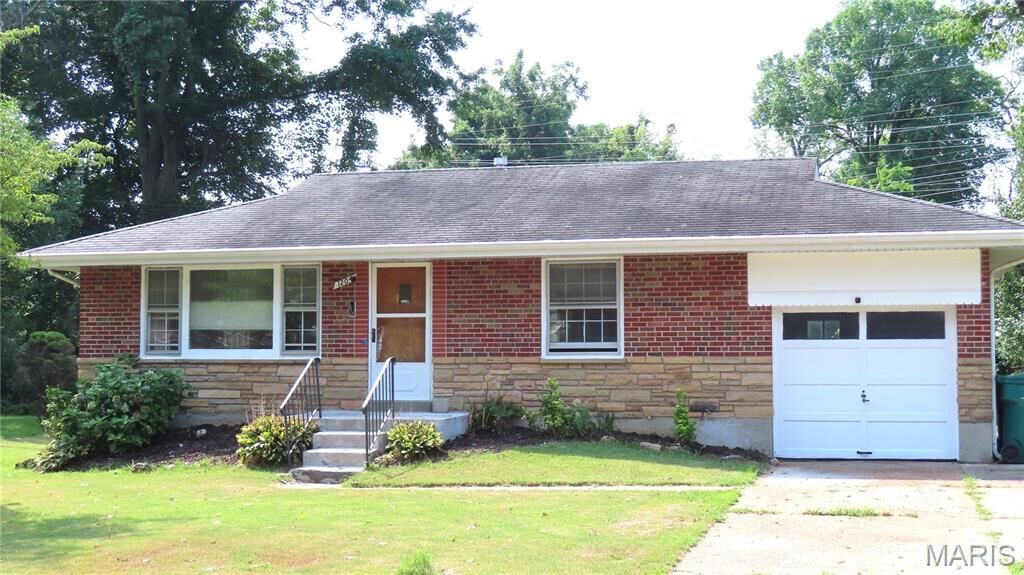Property Photo: 1204 Mead Drive MO 63137