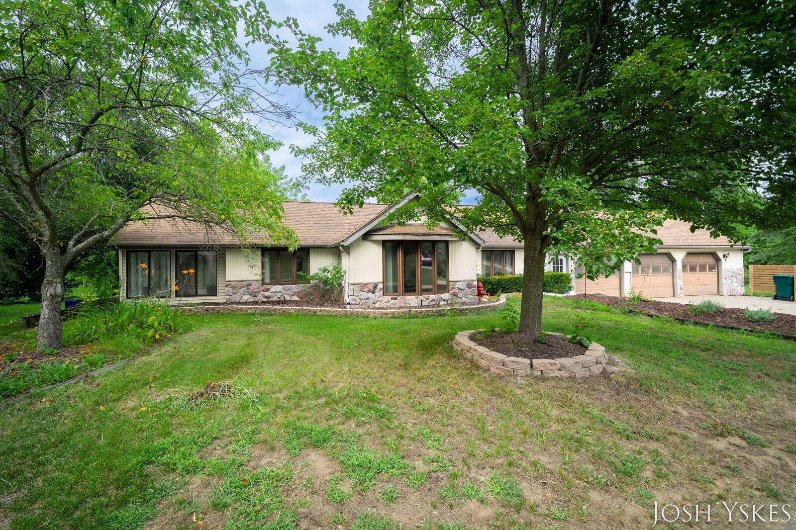 Property Photo: 5855 Grand River Drive NE MI 49301