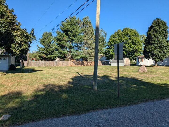 Property Photo:  18075 Shamrock Boulevard  MI 49307 