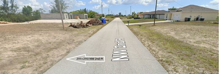 Property Photo:  2111 + 2113 NW 2nd Place  FL 33993 