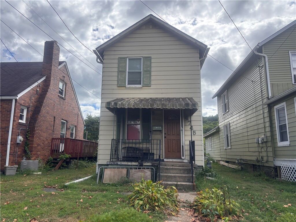 Property Photo:  4745 5th Ave  PA 15010 
