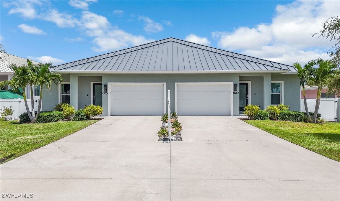 Property Photo:  605/609 107th Avenue N  FL 34108 
