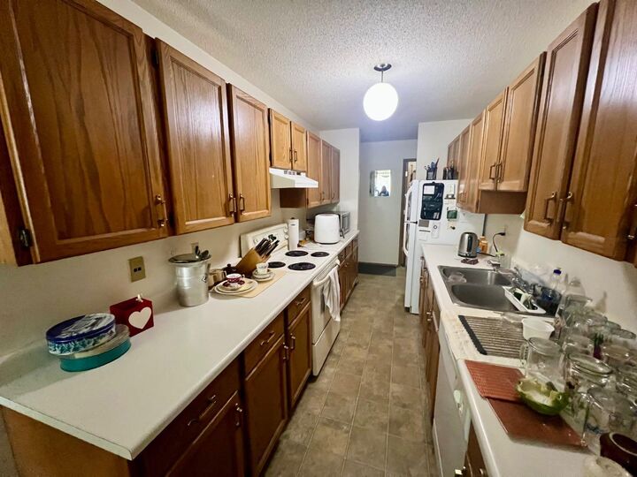 Property Photo: 5502 58A Street 204 AB T4N 2N3