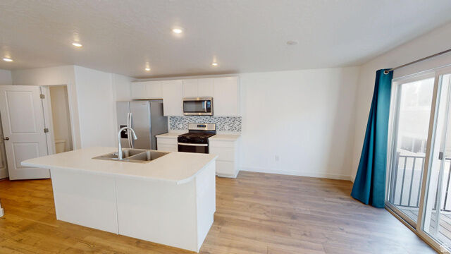 Property Photo: 1917 N Blue Iris Ave E 1090 UT 84074