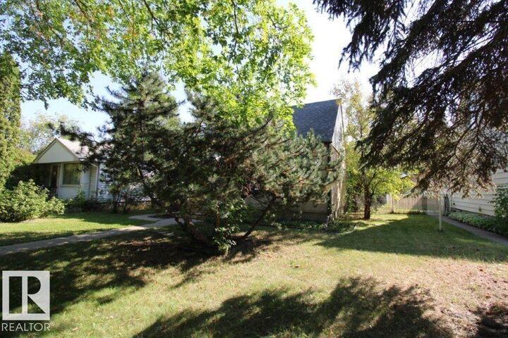 Property Photo: 12143 59 Street NW AB T5W 3Y4
