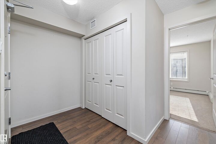 Property Photo: 142 Ebbers Boulevard NW 302 AB T5Y 3W2