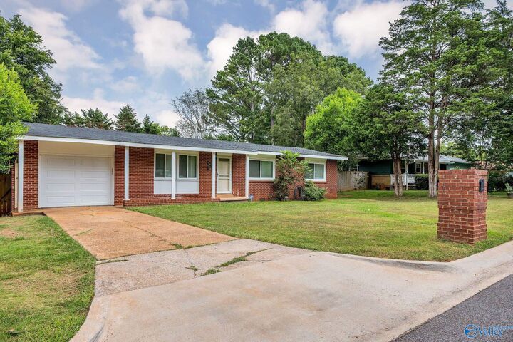 Property Photo: 3107 Acklen Drive SW AL 35805