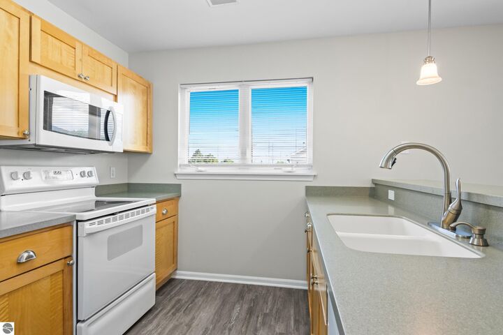 Property Photo: 1122 Lake Ridge Drive 201 MI 49684