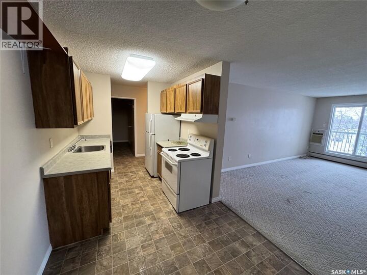 Property Photo:  306 1808 Eaglesham Avenue  SK S4H 3A8 