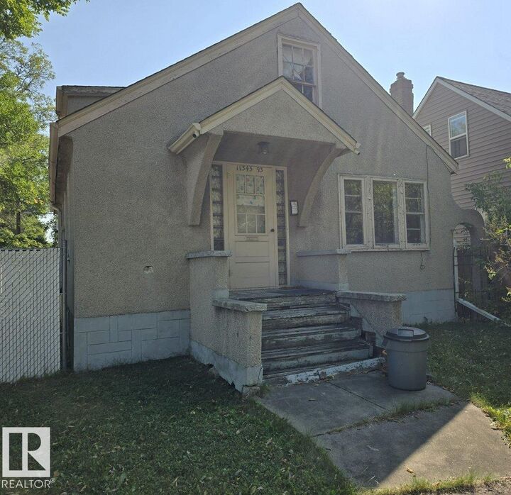 Property Photo: 11345 93 Street NW AB T5G 1C3