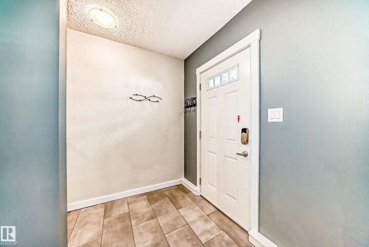 Property Photo: 903 Crystallina Nera Way NW 94 AB T5Z 0N6