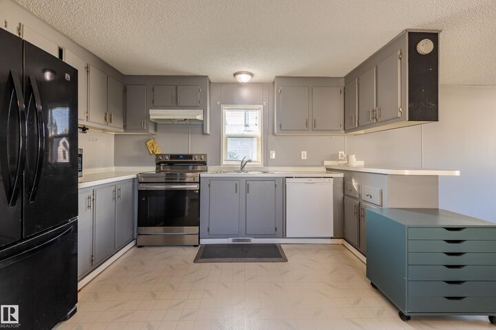 Photo de la propriété:  10410 101A Street 5  AB T8R 1A1 