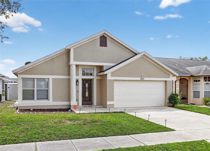 Property Photo: 8820 Tottenham Way FL 34747