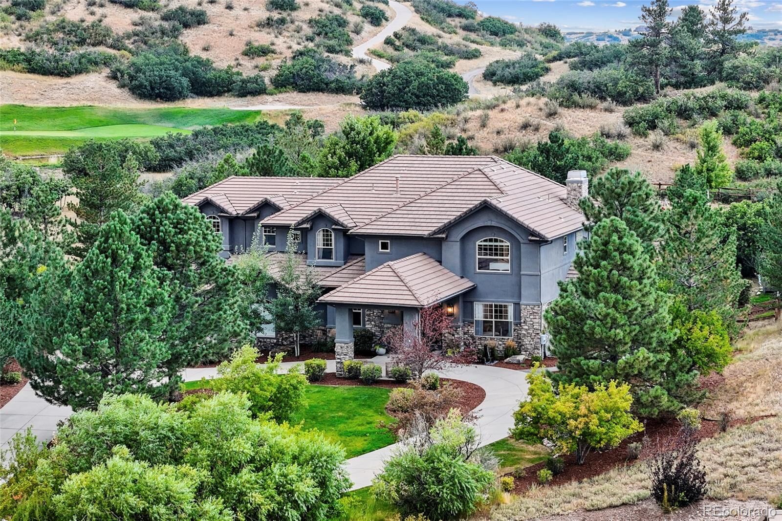 Property Photo: 4875 Wilderness Place CO 80134