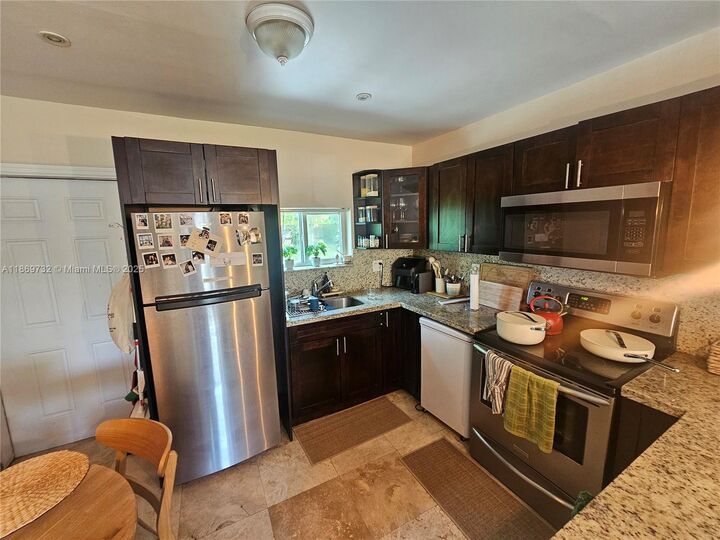 Property Photo: 455 NW 127th St FL 33168