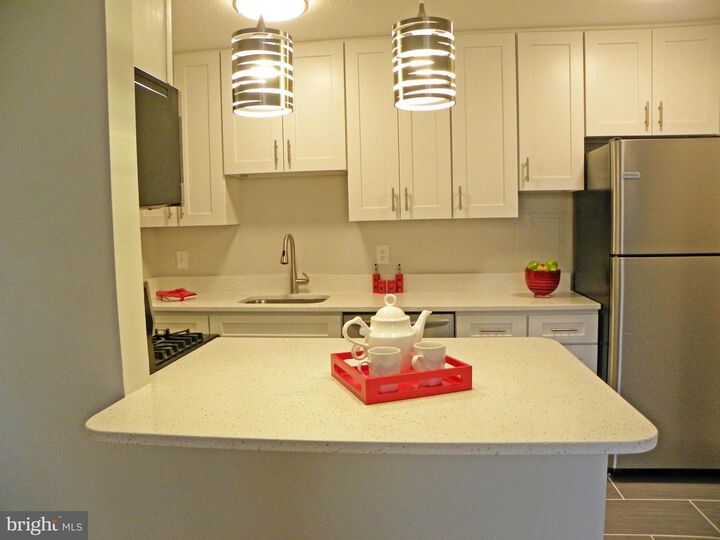 Property Photo: 501 Slaters Lane 212 VA 22314