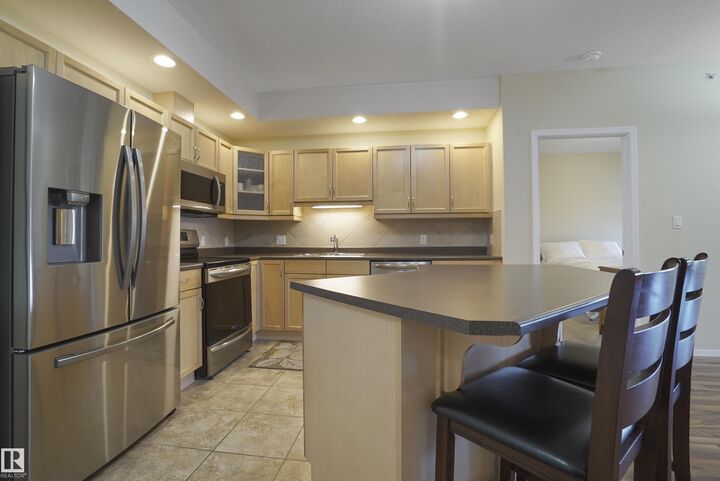 Property Photo: 1320 Rutherford Road SW 402 AB T6W 0B6