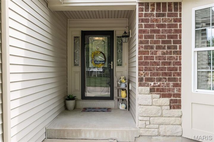 Property Photo:  48 Burgundy Place Drive  MO 63368 