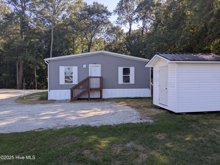 Property Photo:  1118 E Old Tar Landing Road  NC 28540 