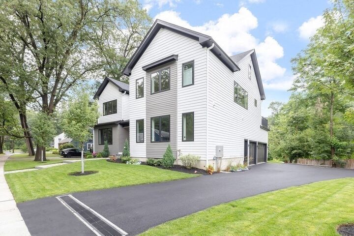 Property Photo:  45 E Quinobequin Road  MA 02468 
