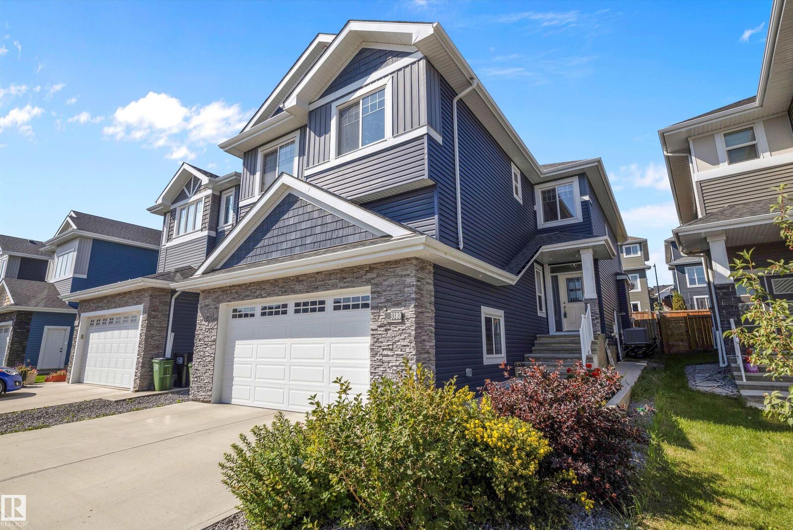 Property Photo: 3380 Chickadee Drive NW AB T5S 0K9