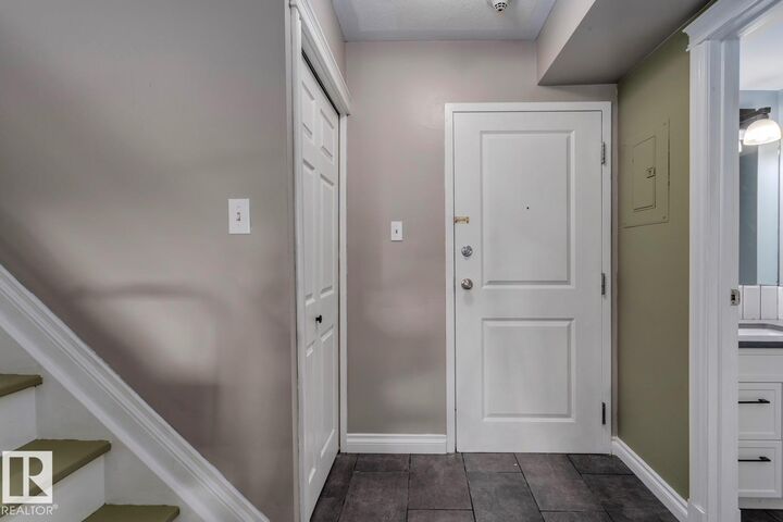Property Photo: 11033 127 Street NW 209 AB T5M 0T3