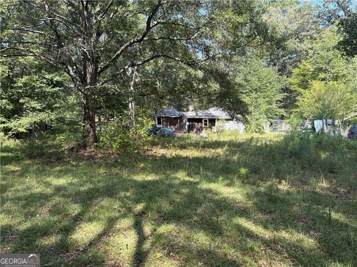 Property Photo:  6355 Kimberly Mill Road  GA 30349 