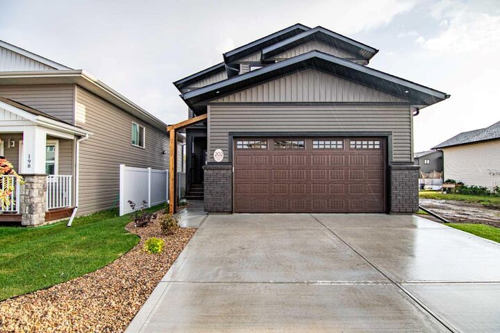Property Photo:  202 Livingston Close  AB T4R 0S8 