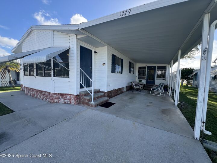 Property Photo: 1229 Calusa Drive FL 32976