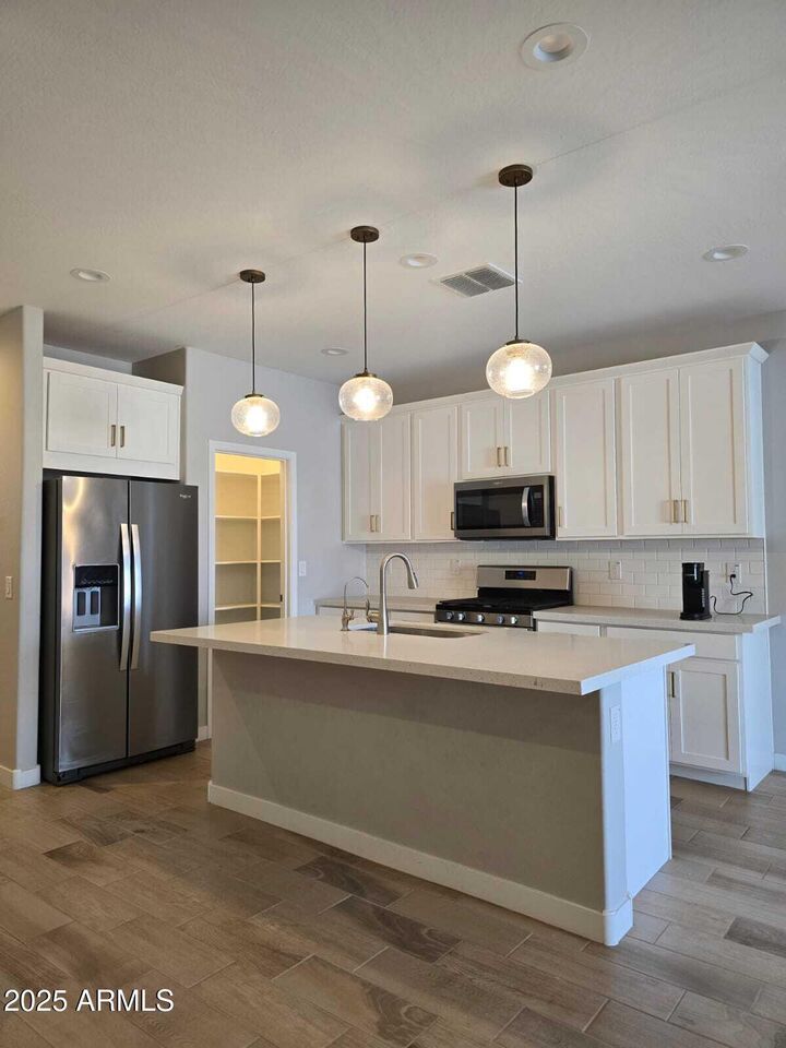 Property Photo:  10968 W Baden Street  AZ 85323 