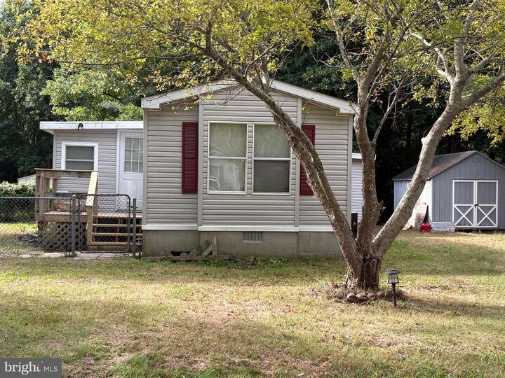 Property Photo: 37088 E White Tail Drive DE 19975