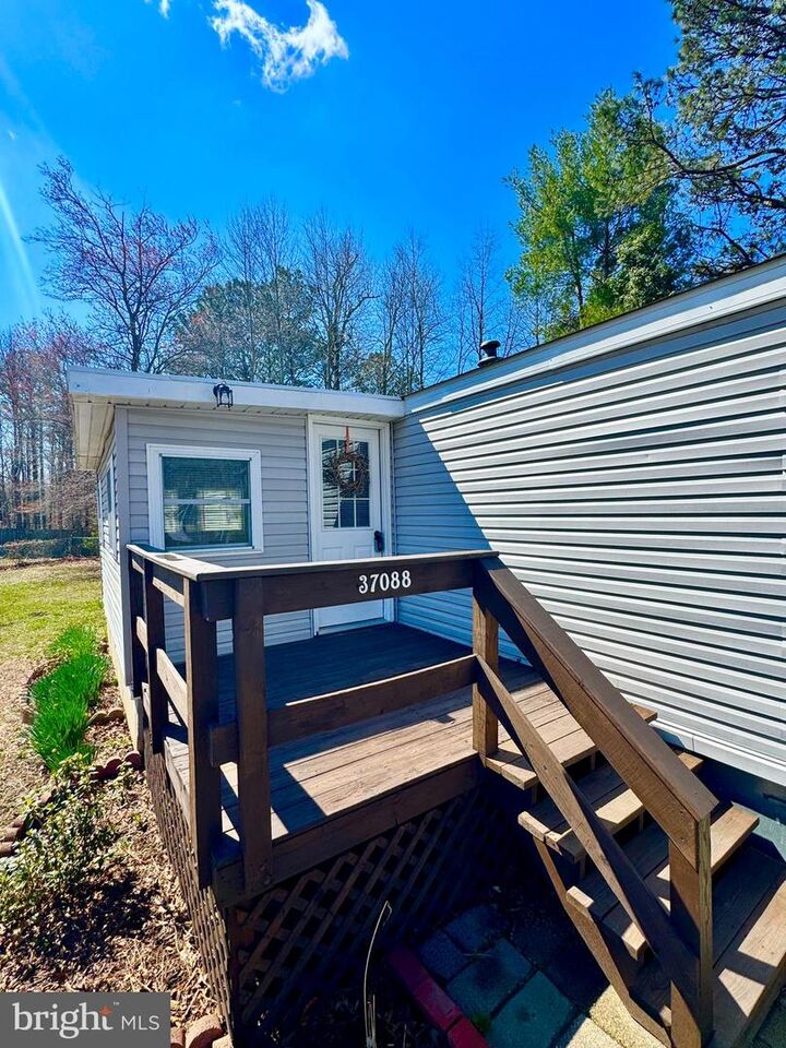 Property Photo:  37088 E White Tail Drive  DE 19975 