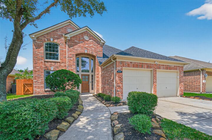 Property Photo: 2111 Pinecreek Pass Lane TX 77449