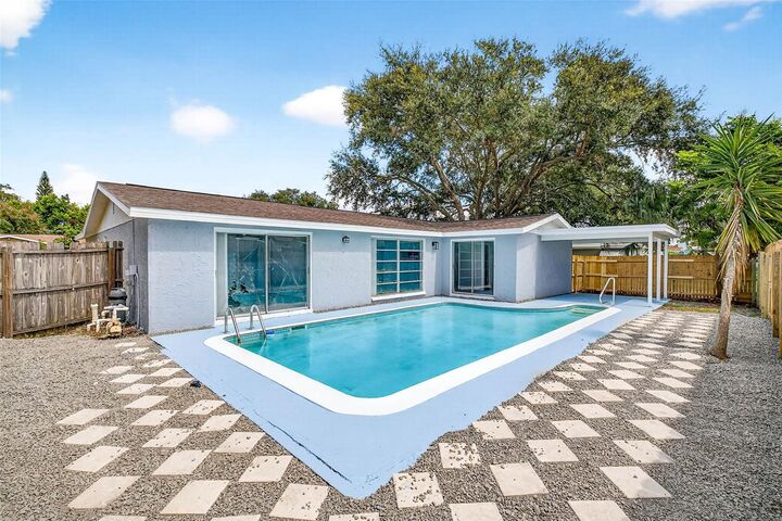 Property Photo: 9633 Lakeside Lane FL 34668