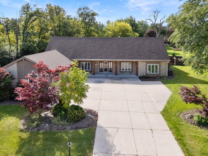 Property Photo:  W162n8224 Tamarack Ct  WI 53051 