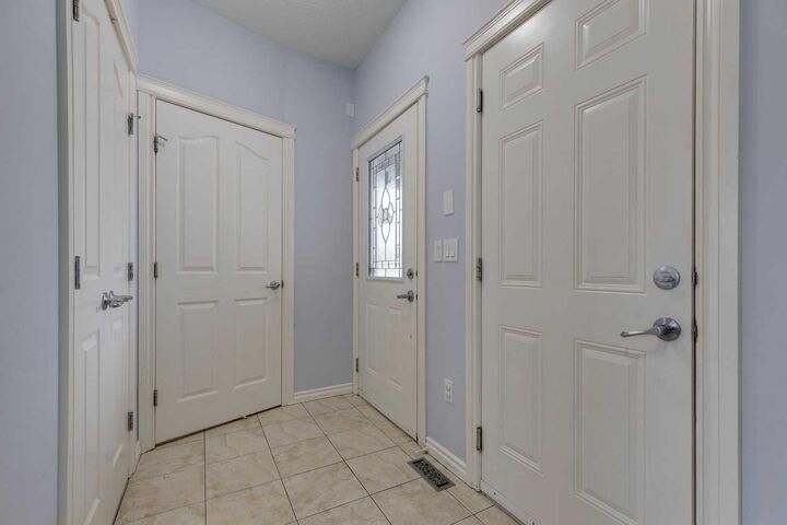 Property Photo: 1754 Baywater Drive SW AB T4B 0T7